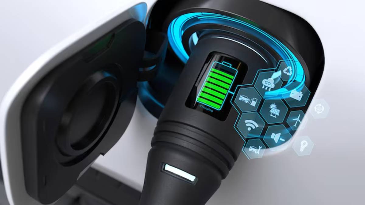 Close-up of an electric vehicle charging port showing a battery icon with green indicators and various connected technology symbols.
